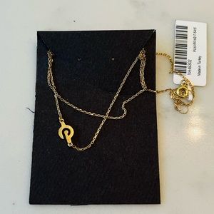 Gold Peloton necklace